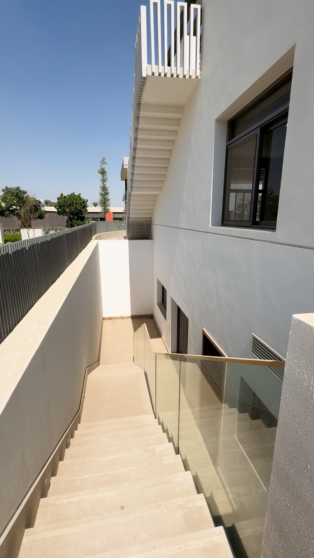 Exterior staircase, glass balustrade