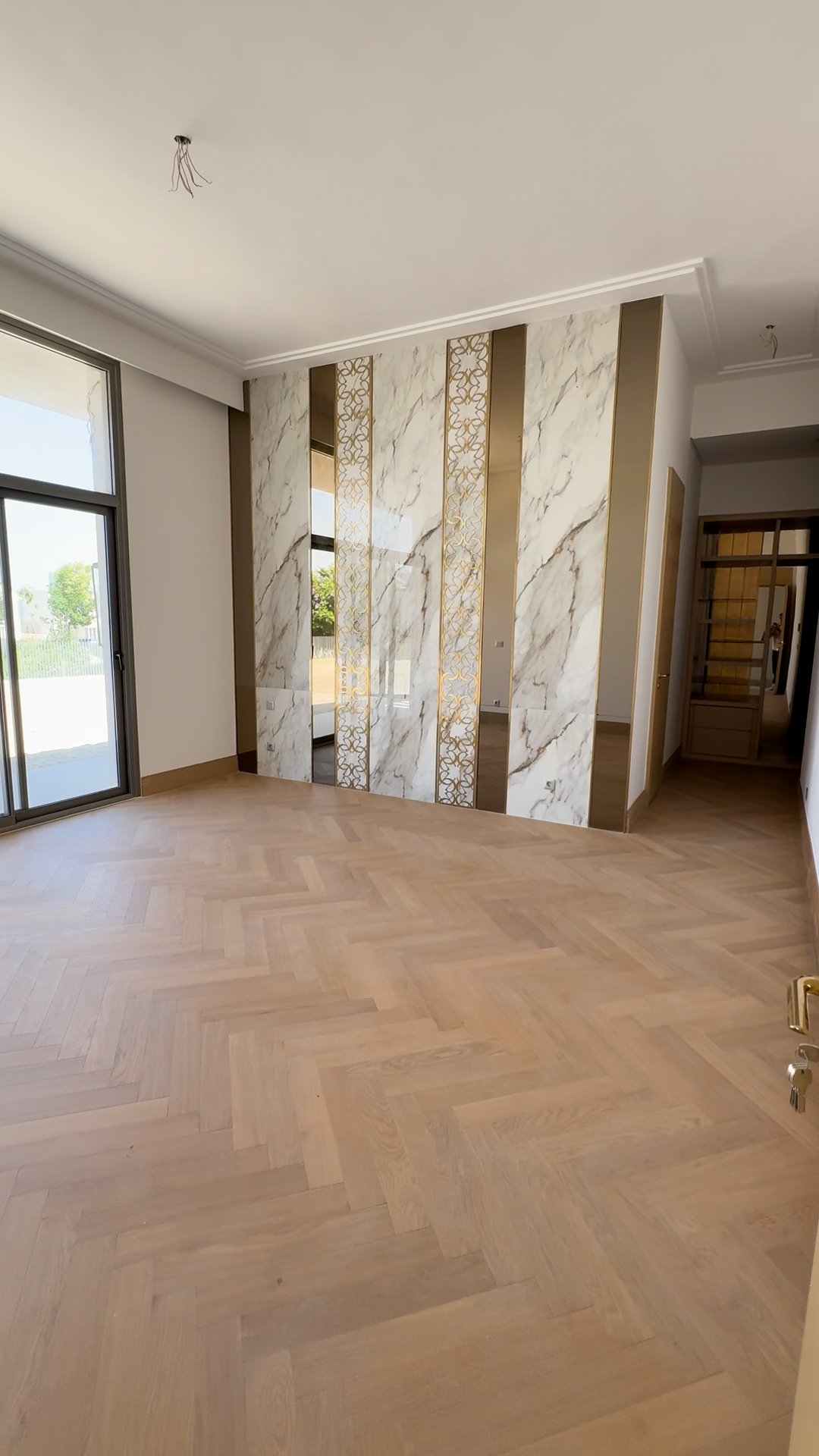 Bedroom with marble accent wall